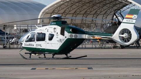 Moron, Spain - 12 May 23: Guardia Civil Helicopter on Tarmac Stock Photos