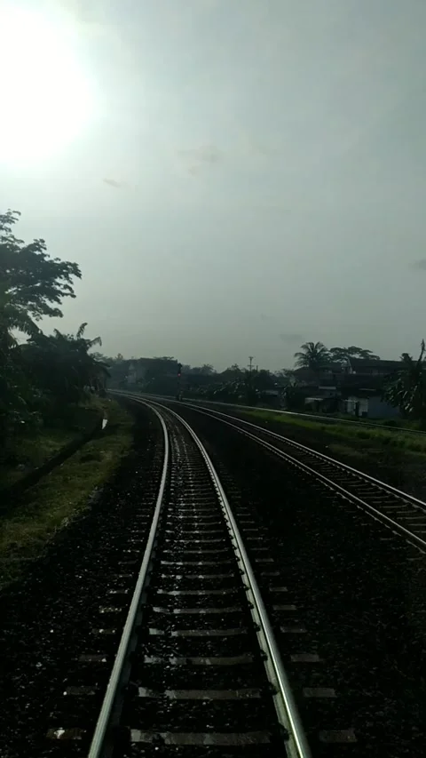 Morrning view of the train at Kroya Station, Cilacap, Central Java, Indonesia. Stock Footage 212065333
