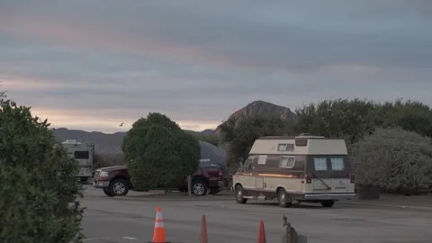MORRO BAY, CA - DECEMBER 10, 2022 - RV, camper van parked at coastal campground Stock Footage 345146456
