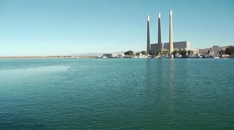Morro Bay stacks from water Stock Footage 64025415