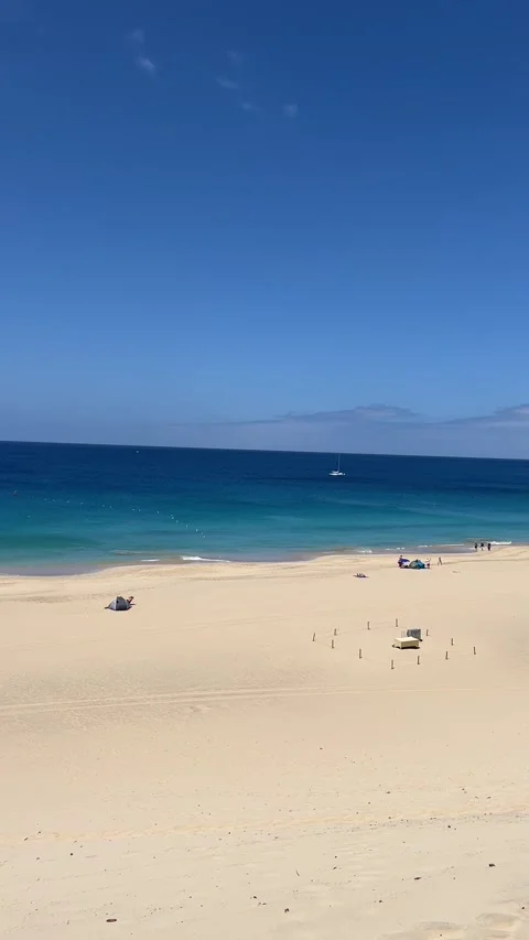 Morro Jable beach ocean pan golden sand resort view Fuerteventura HD vertical Vídeo Stock 342035479