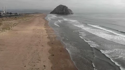 Morro Rock Drone view over the ocean on a cloudy day Stock Footage 241362513
