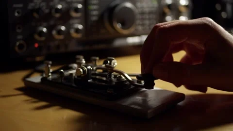 Morse Code Radio Telegraphy CW Ham Radio Straight Key with Radio in the Stock Footage 220903621