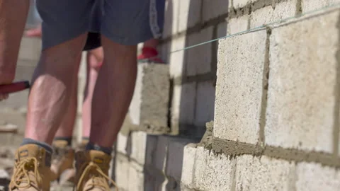 Mortar Added To Wall Before Concrete Block Stock Footage 239686323