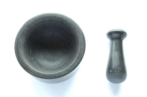 Mortar and pestle on white background Stock Photos