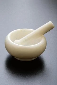 Mortar on black table Stock Photos