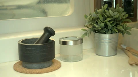 Mortar on the counter of a kitchen Stock Footage 67499404