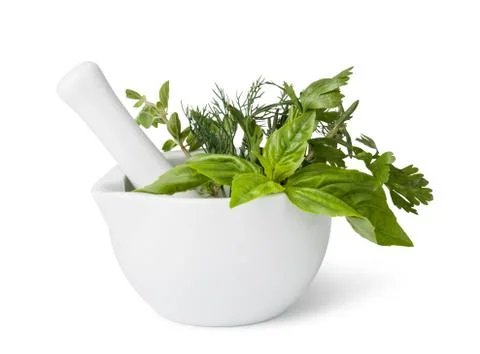 Mortar with herbs isolated Stock Photos