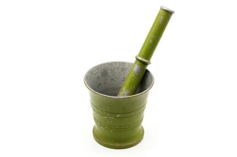 Mortar for squeezing food on a white background Stock Photos