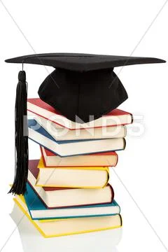 Mortarboard on books stack Stock Photos