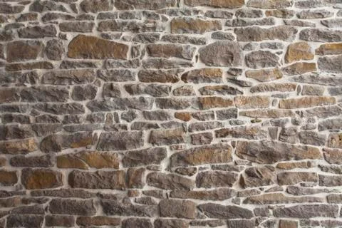 Mortared stone wall background Stock Photos