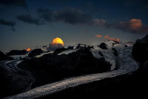Morteratsch glacier in Bernina group with dramatic clouds St Moritz Engadin Foto stock