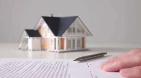 Mortgage contract Stock Footage 54827597