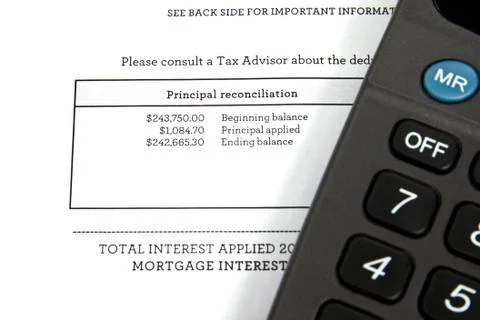 Mortgage document with calculator Stock Photos