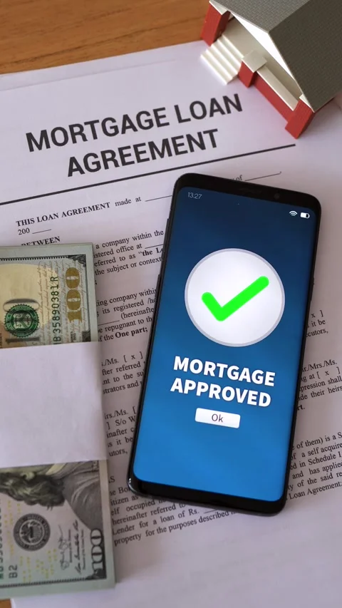 Mortgage loan approved notification. Concept of getting in debt to buy real Stock Footage 308994528