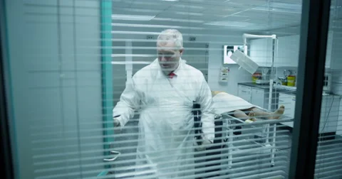 A mortician is making notes Stock Footage 66348811