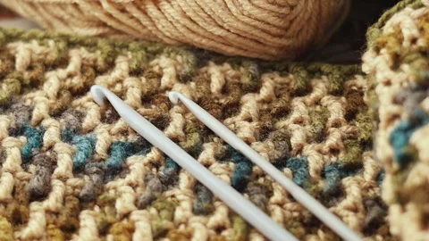Mosaic Crochet Pattern with Yarn and Hook on Wood Stock Footage 341331218