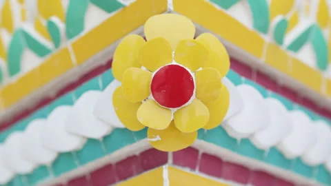 Mosaic daisy decorates wall of asian church. Stock Footage 306574971