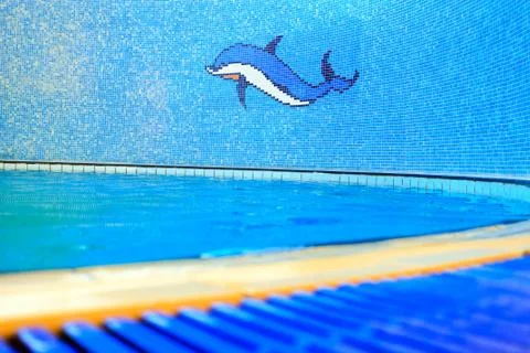 Mosaic of dolphin in a pool Stock Photos