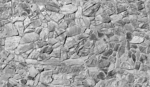 Mosaic gray stone wall pattern, front view, seamless background photo Stock Photos