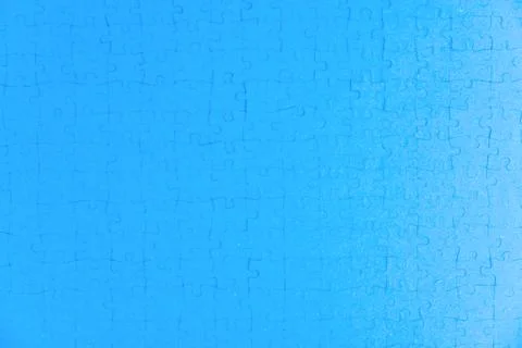 Mosaic monotonous structural background: blue surface built with puzzle Stock Photos