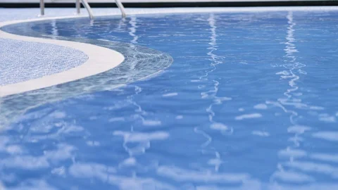 Mosaic side and white grille in blue and white,pool with clear transparent water Stock Footage 122223938