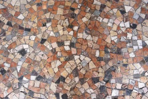 Mosaic surface with irregularly shaped multicolored elements Stock Photos
