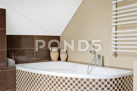 Mosaic tile bathtub idea Stock Photos