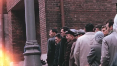 Moscow - 1963: People in a queue opposite St Basil's Cathedral in Red Square Stock Footage 168472632