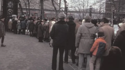 Moscow - 1980: Soviet citizens queue in front of metro entrance and Hotel Moskva Video stock 302058013