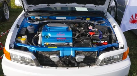 MOSCOW, CIRCA 2015: Turbo engine tuned sports car at the show. Open hood pano Stock Footage 52712522