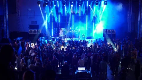 MOSCOW. CIRCA 2017: DJs playing and performing set in fornt of crowd of people Stock Footage 84777725