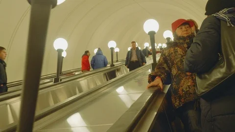 MOSCOW - CIRCA APRIL, 2018: View of people movig down using escalator Stock-Footage 89957789