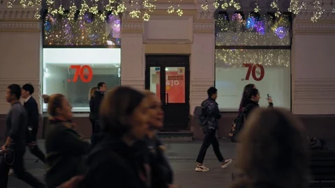 MOSCOW - CIRCA OCTOBER 2019: Walking people. Nikolskaya street. Evening Stock Footage 118741663