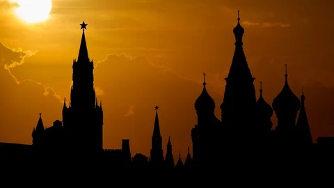 Moscow: Kremlin (Spasskaya Tower) and Saint Basil's Cathedral in Red Square Stock Footage
