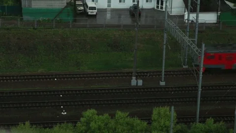 Moscow, Russia, 2017 - suburban train moving during heavy rain. Stock Footage