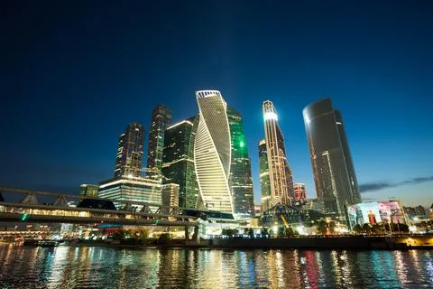 Moscow, Russia. Evolution Tower and Moscow City skyscrapers at twilight, il.. Photos