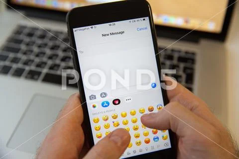 Moscow / Russia - February 20, 2019: typing a new message on the iPhone on th Stock Photos