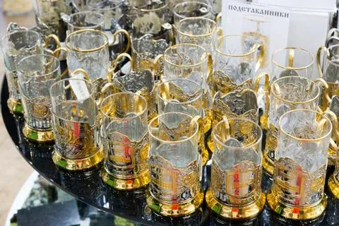 Moscow, Russia - January 10 2015 Glass cups in metal cup holders at  gift shop Stock Photos