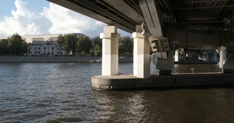 Moscow, Russia - July 2019: Sailing pleasure craft under the metro bridge Stock Footage 113801853