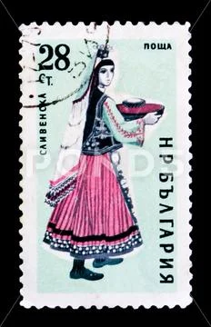 MOSCOW, RUSSIA - JUNE 26, 2017: A stamp printed in Bulgaria shows woman in fo Stock Photos