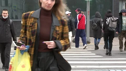 Moscow, Russia - October, 14, 2021. City street. Pedestrians at the crosswalk Stock Footage 164363256