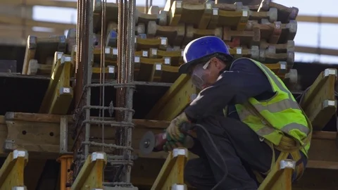 MOSCOW, RUSSIA - SEP 15, 2018: Worker using industrial grinder Stock Footage 100762853