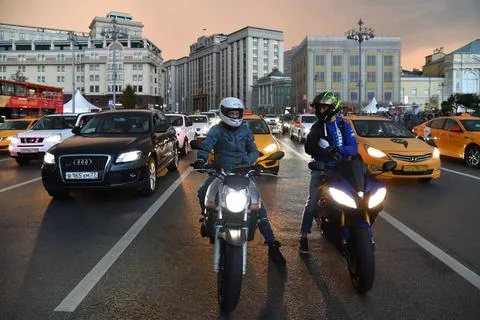  Moscow, Russia - September 22. 2018. motorcyclists and traffic on Teatral... Stock Photos