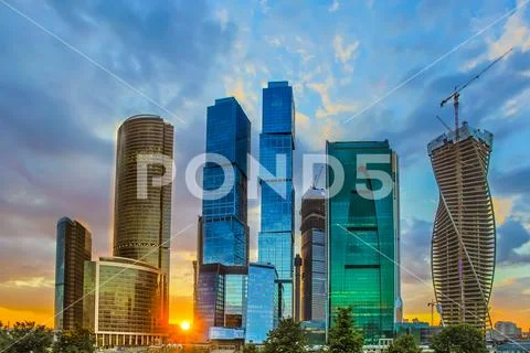 The Moscow skyscraper on the background of sunset. Wide angle Stock Photos