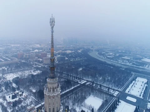 Moscow state university in snowy winter. Aerial view. Flying around. Stock Footage