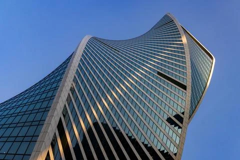 Moscows Modern Marvel: Evo Tower Reflecting the Evening Sky Stock Photos