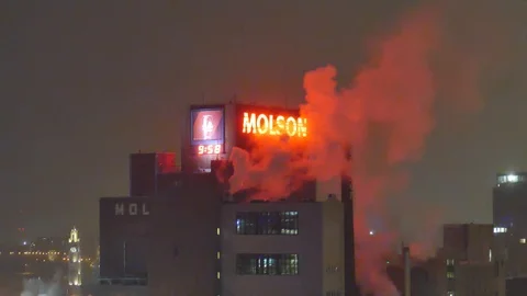 Moslon building with red lights and smoke Stock Footage 125549304