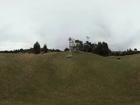 Mosman grassy hill with Celtic cross 360 Standing height Stock Footage 80359597