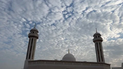 The mosque and behind it is the sky full of beautiful white clouds Stock Footage 296479903